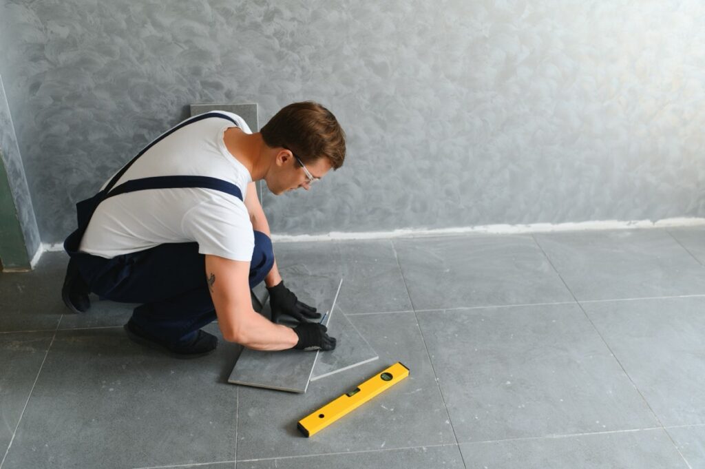 industrial worker handyman installing big ceramic 2025 03 18 04 59 53 utc small